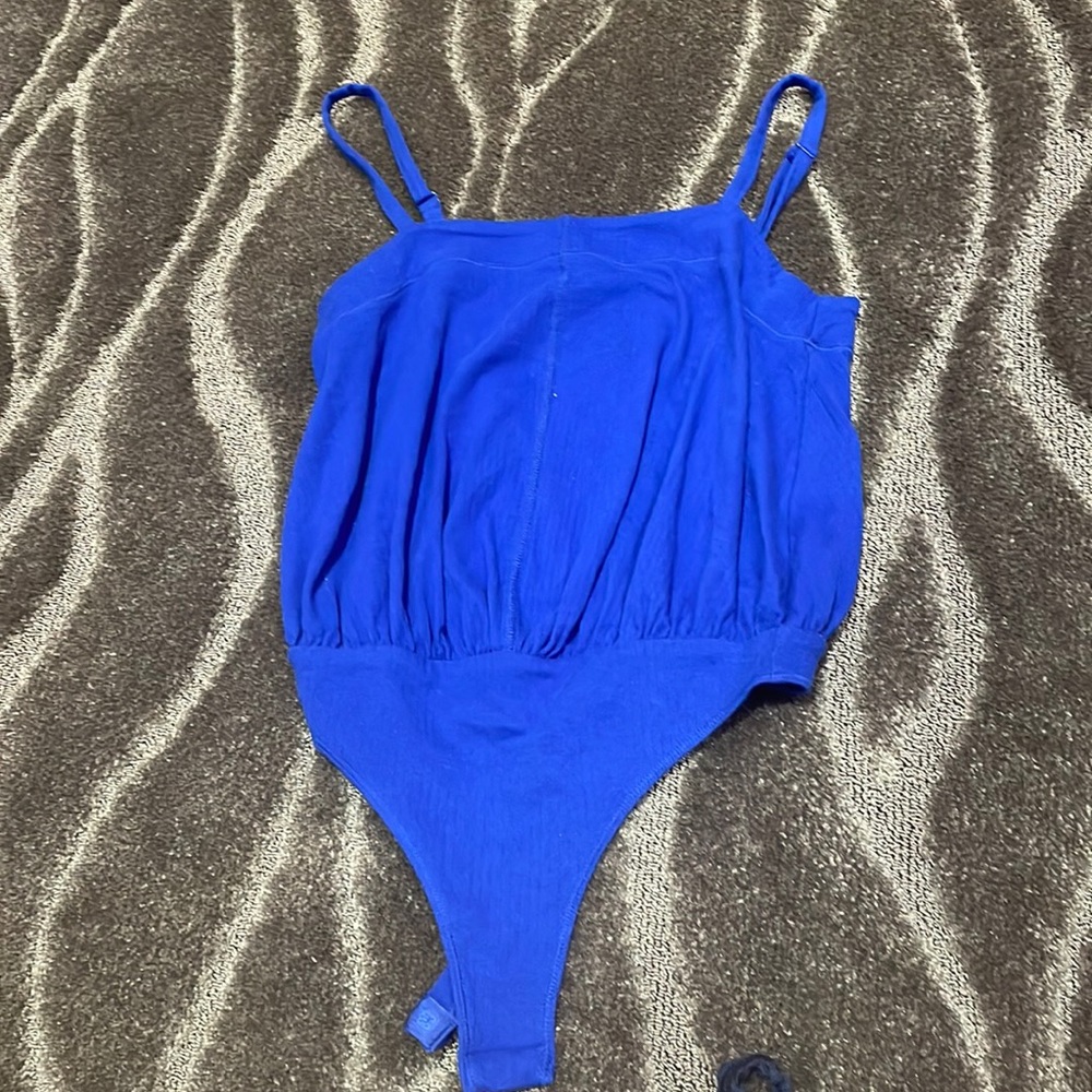 Royal blue casual body suit with adjustable straps and button closure. Size: xs